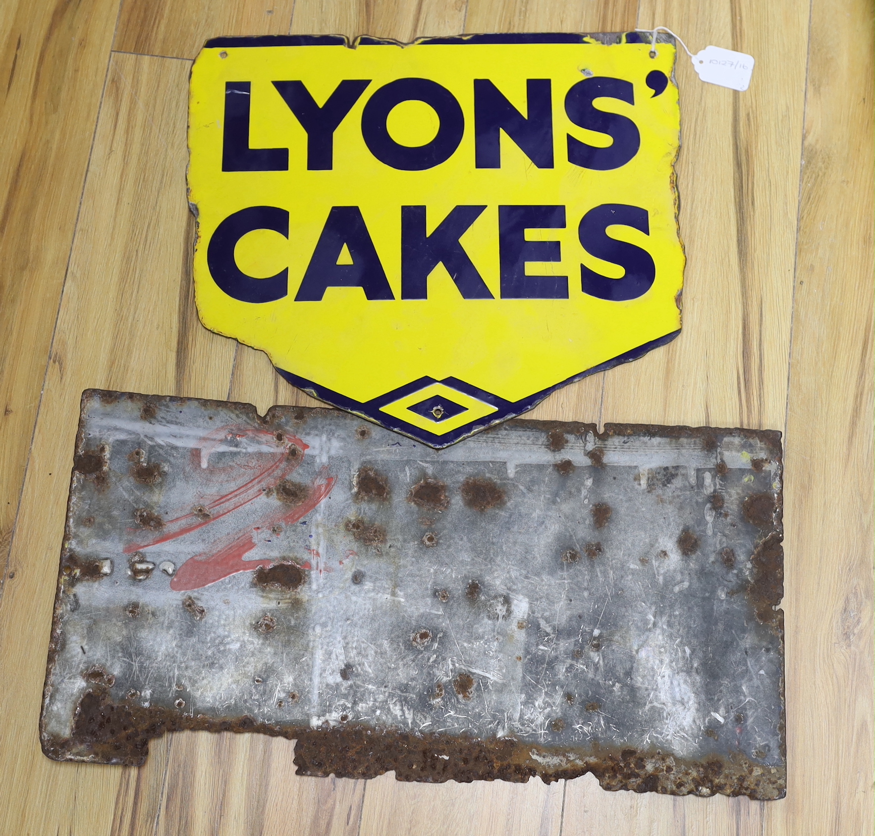 Two enamel advertising signs: Wheel Brand Gossages’ Dry Soap and Lyons' Cakes, widest 59cm